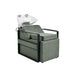 Agave green booster seat placed on a professional shampoo unit for height adjustment