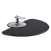 Small black round anti-fatigue floor mat positioned around a chrome salon chair base