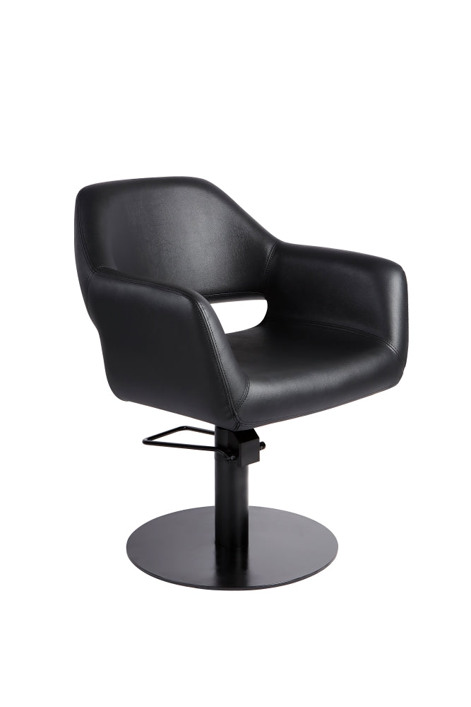 Black salon styling chair with round black base front view