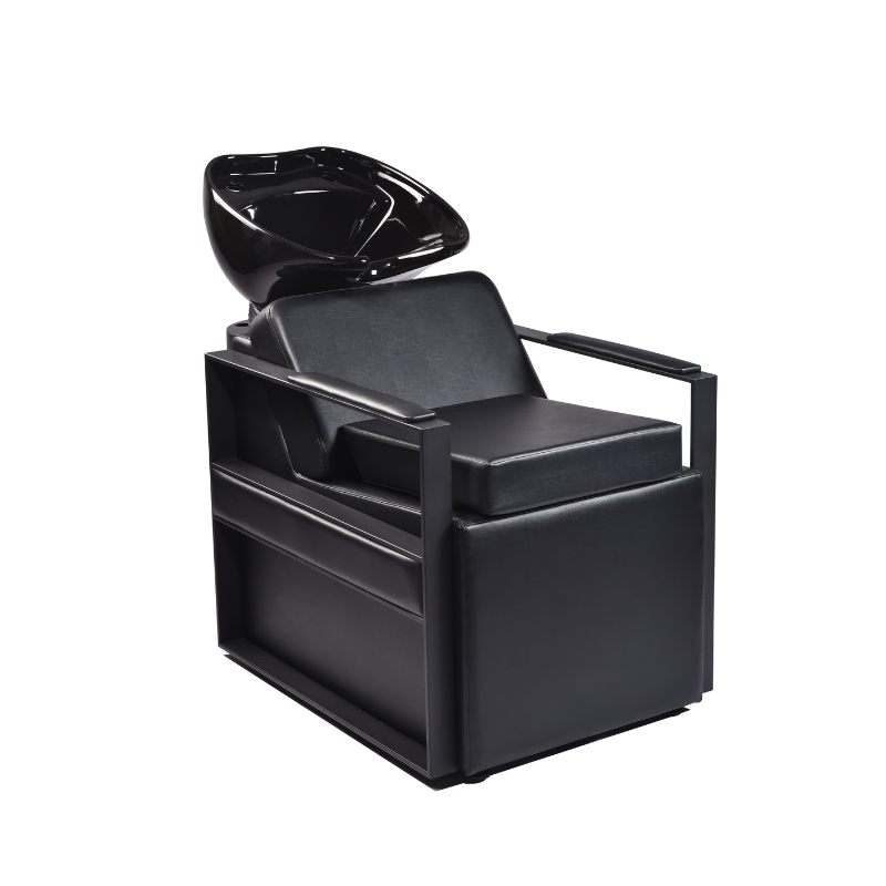 Black professional shampoo unit booster seat showing ergonomic fit on a salon basin chair
