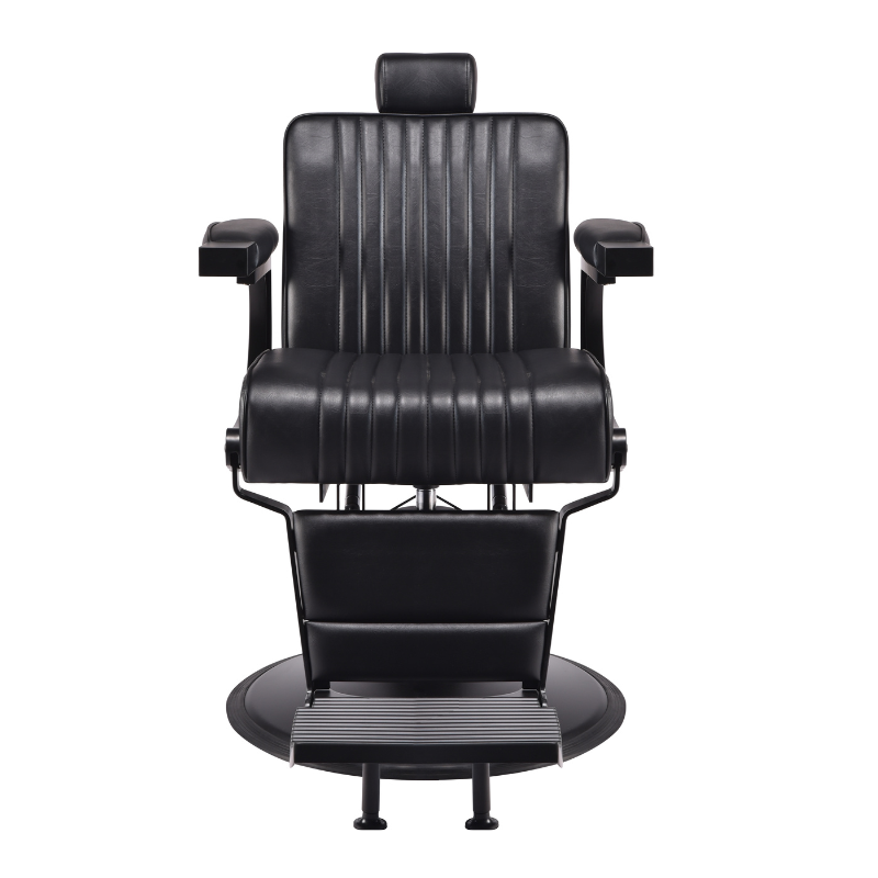 Black professional barber chair with reclining backrest and hydraulic base