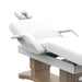Side view of Karma Bethels Beach electric beauty bed in white with wood accents