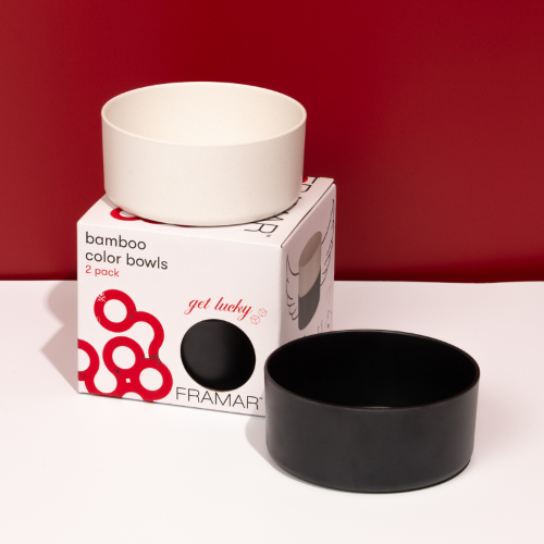 Set of two Framar Get Lucky bamboo colour bowls showing the white interior and black exterior