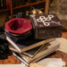 Framar Dark Academia color bowls stacked on books showing compact storage for professional salons