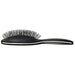 Side profile of the black Framar brush showing the flexible detangling bristles