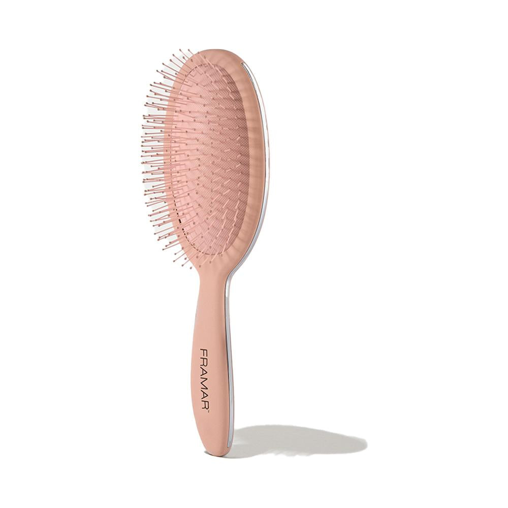 Side of the Champagne Mami brush showing the sleek professional finish