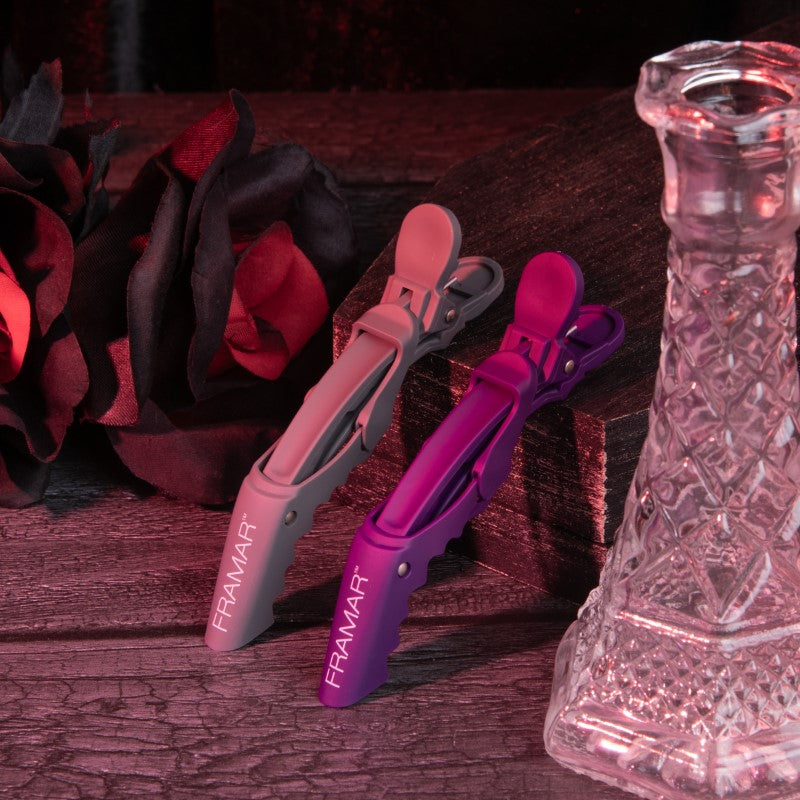 Pair of Framar Gator Grips in purple and grey showing the rubberised texture and branding