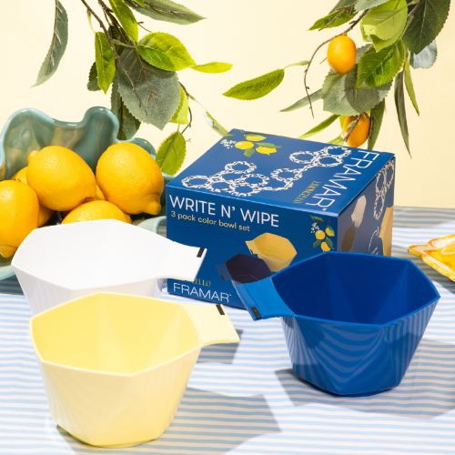 Professional salon colour station setup featuring Framar Limoncello bowls and packaging on a yellow themed display