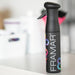 Side view of Framar Myst Assist black continuous mist spray bottle used in a professional salon