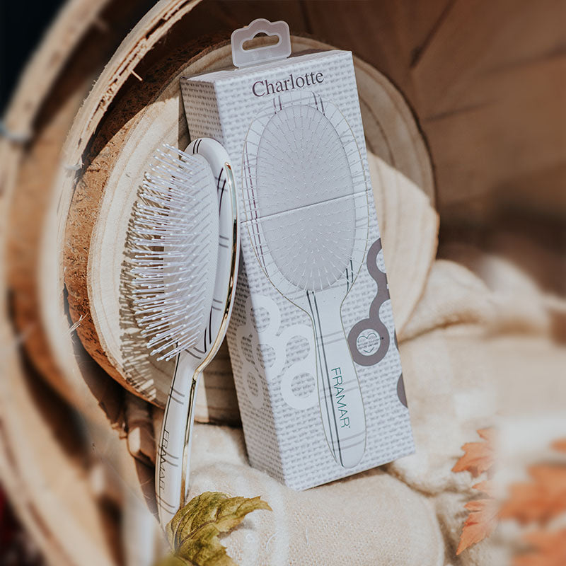 Framar Charlotte professional detangle brush in ivory plaid and gold trim packaging