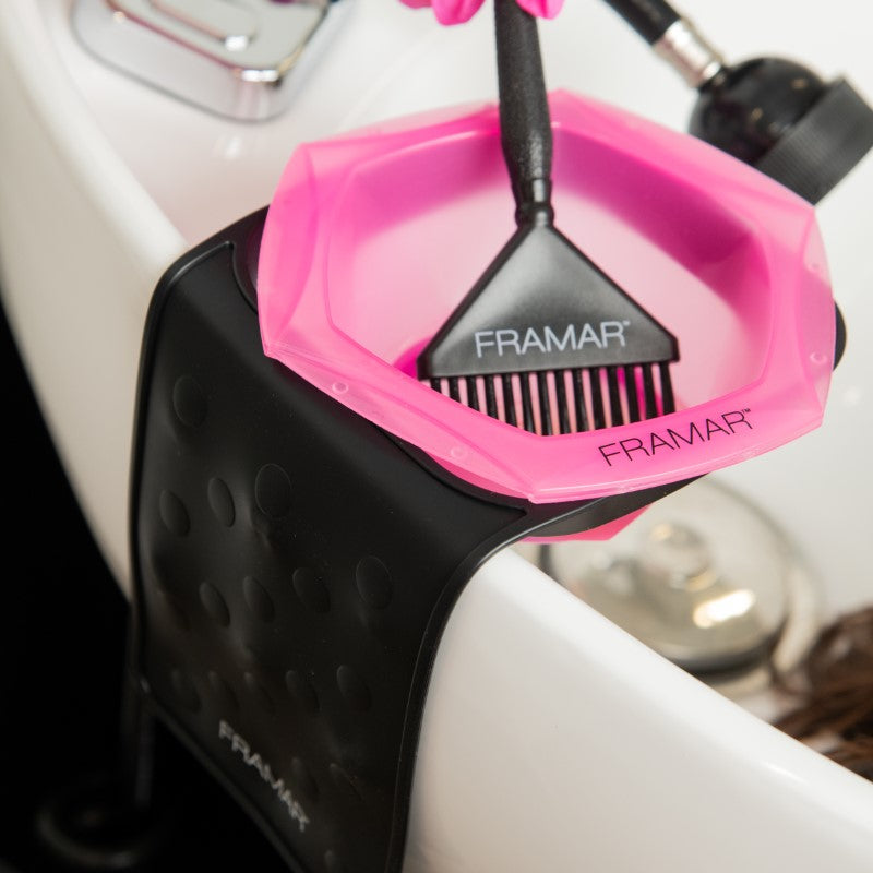 Framar Toning Tub sleeve holding a pink Framar colour bowl and tint brush at the shampoo basin