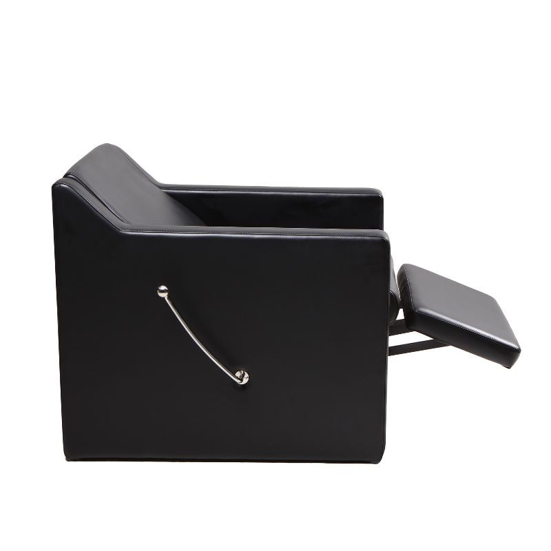 Side view of the Frenciss shampoo lounge showing the reclining footrest and manual lever
