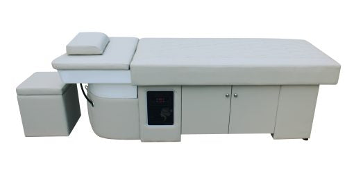 Side profile of Japanese head spa bed showing padded ergonomic design