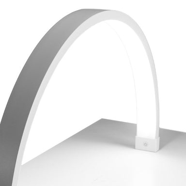 Top view of the Joiken Arch LED lamp highlighting the wide illumination area for nail technicians