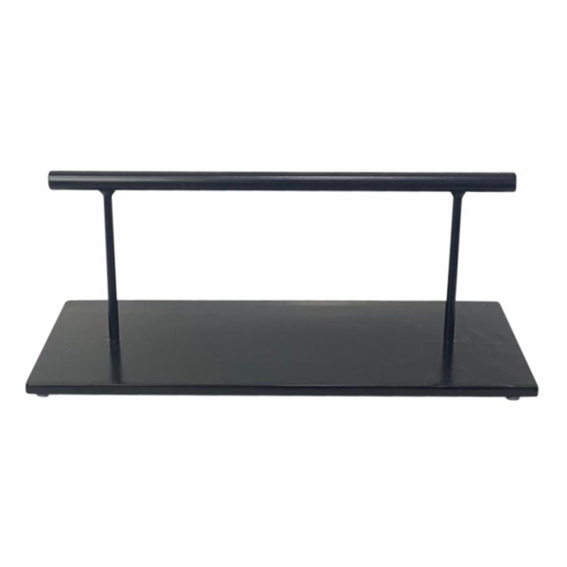 Joiken block footrest in black with floor-mounted design