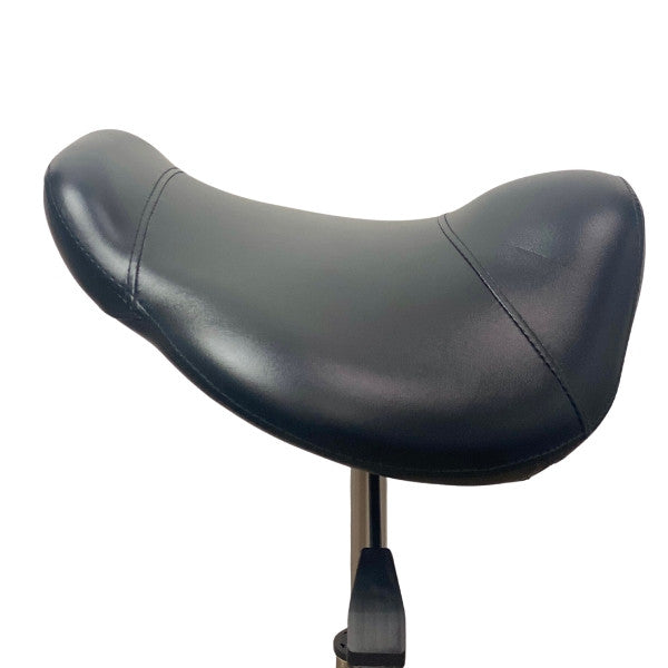Side profile of the Brumby saddle stool showing the ergonomic seat curve for posture support