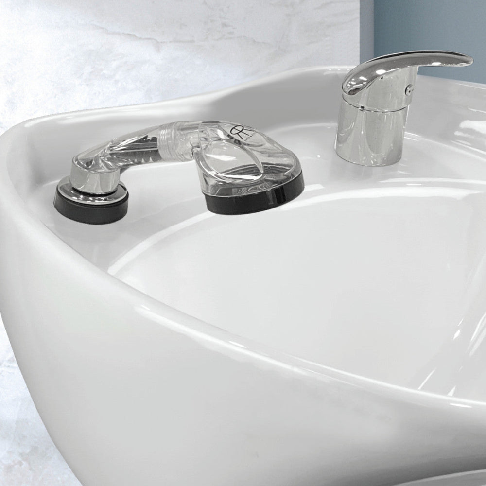 Australian approved chrome salon mixer tap and clear hand shower installed on a white shampoo basin