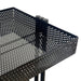 Close up of the black perforated metal storage basket on the Joiken Clem salon trolley