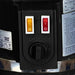 Close up of the Joiken hair steamer control panel featuring power switches and the manual timer dial