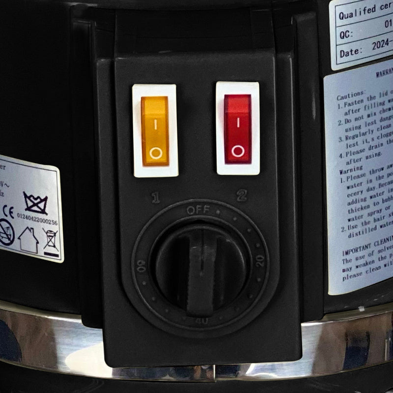 Close up of the Joiken hair steamer control panel featuring power switches and the manual timer dial