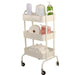 White Joiken Cupid salon trolley organised with towels and beauty products for professional use