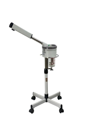 Compact facial steamer with adjustable arm on wheeled base