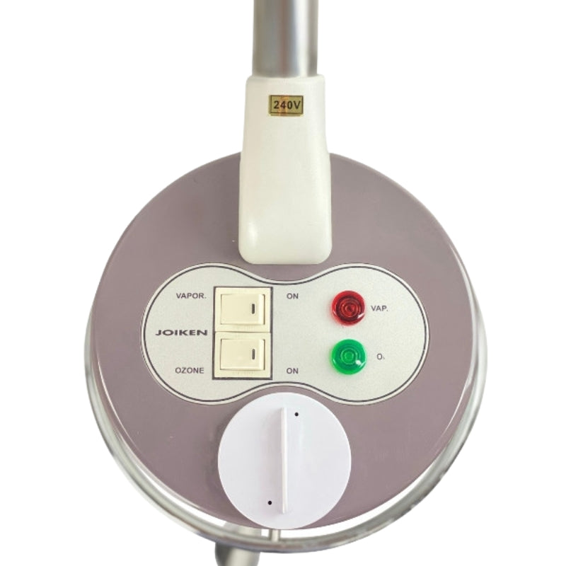 Top view of the white control panel featuring power and ozone switches for the Joiken facial steamer