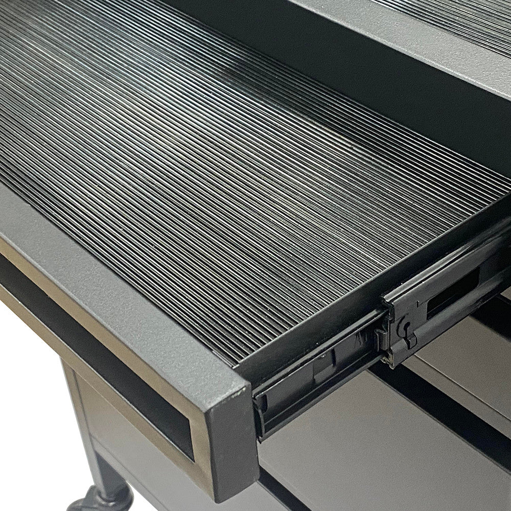 Top tray of the Joiken Fusion PLUS trolley with protective ribbed mat for hair tools