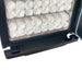 Close-up of internal shelves of Joiken hot towel cabinet holding towels