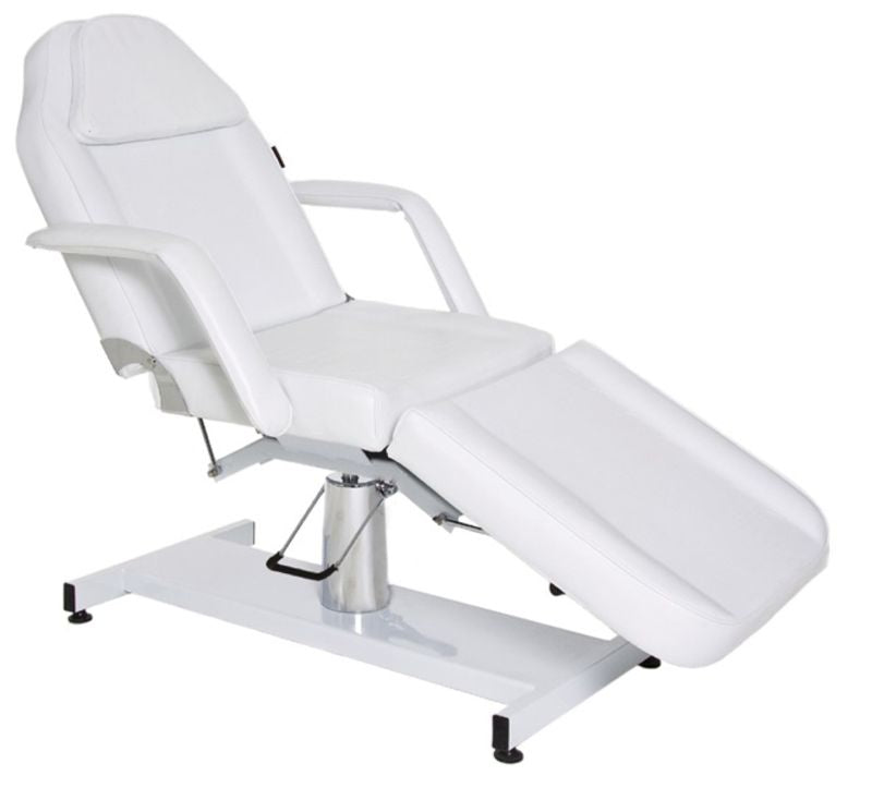 White Joiken hydraulic beauty bed displayed in a reclined position for salon treatments