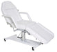 White Joiken hydraulic beauty bed displayed in a reclined position for salon treatments