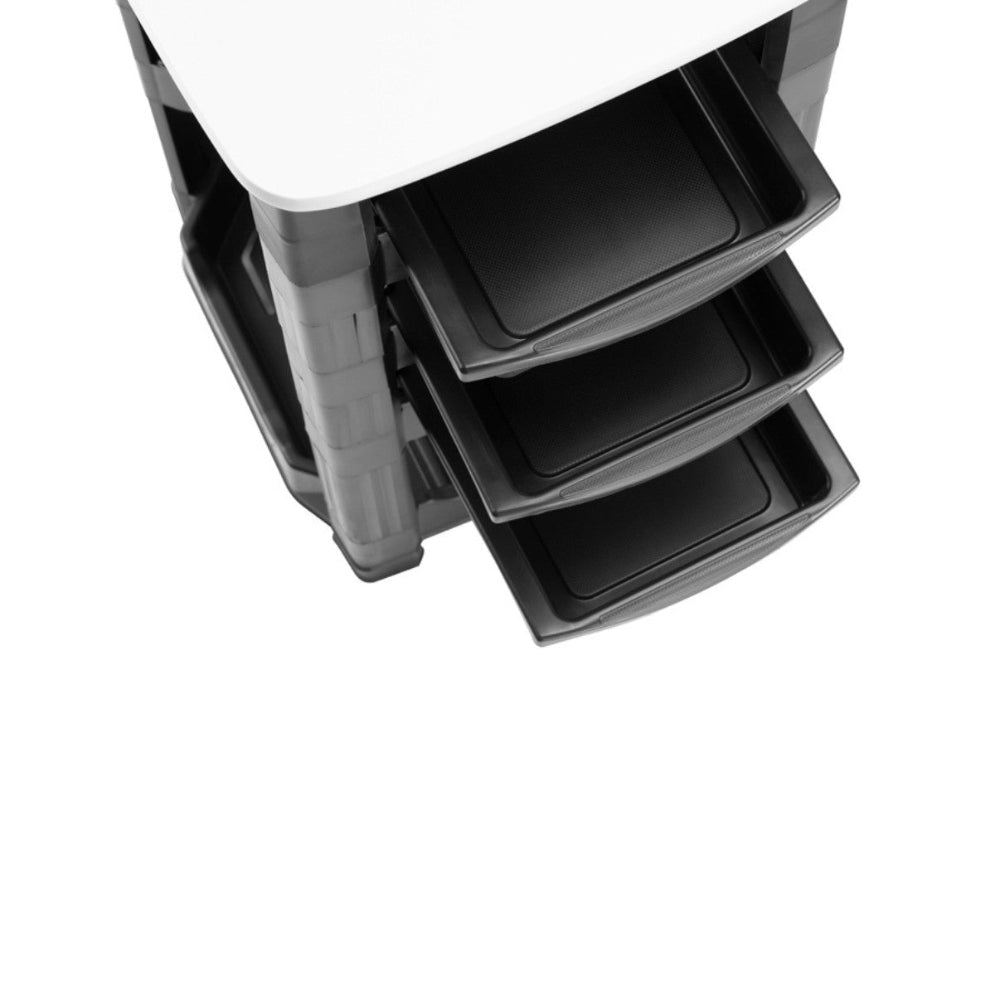 Top down view of the open black drawers on the Joiken Muse professional nail desk