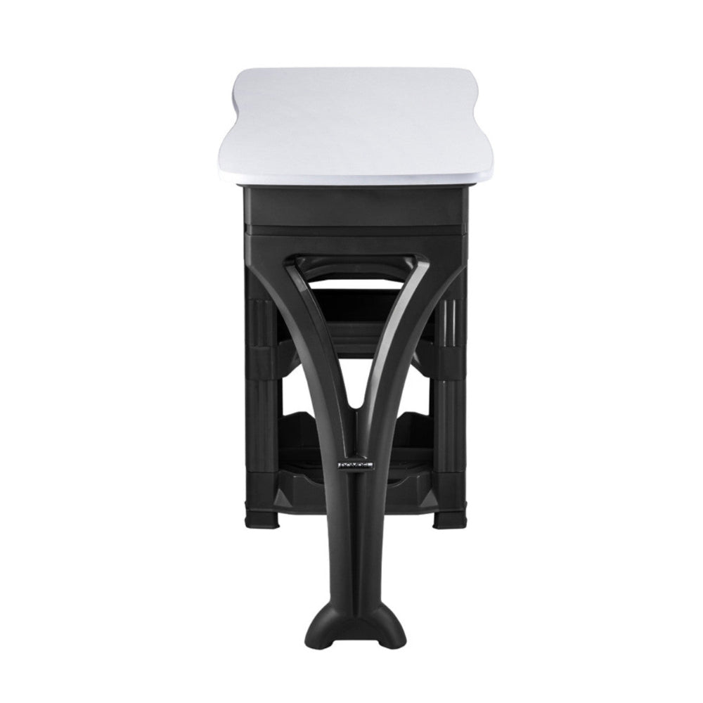 Rear view of the Muse manicure table highlighting the modern curved support leg and sleek white tabletop