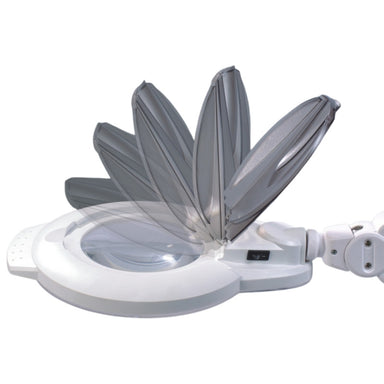 Close up of Joiken Opal 252 LED magnifying lamp head showing the protective flip lid and dual dioptre glass lens