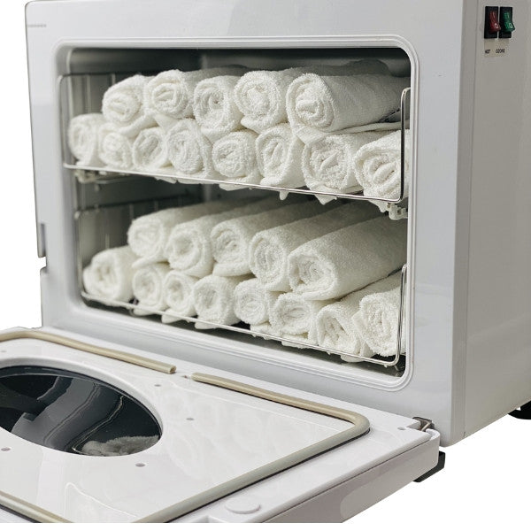 Professional Joiken OPAL towel cabinet interior with towels and UV light indicator