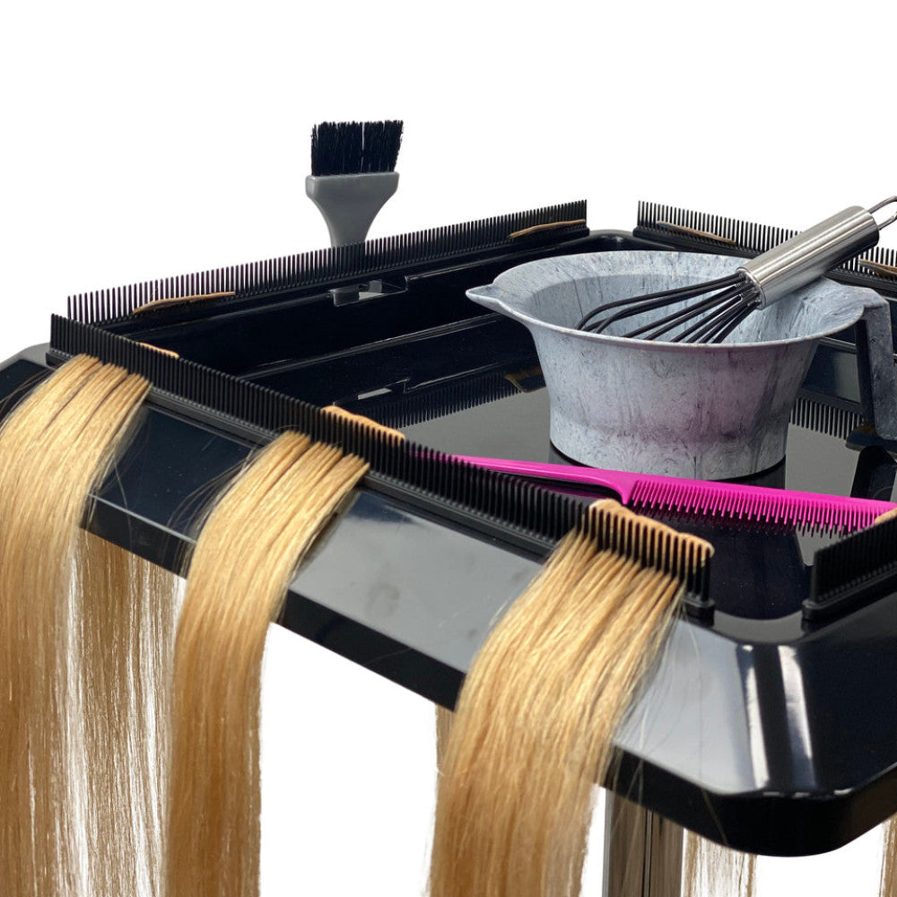 Close up view of the Joiken Pulsar salon trolley featuring integrated hair extension storage combs
