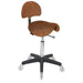 Joiken saddle stool with lumbar support in tan upholstery and black base