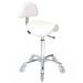 White ergonomic saddle stool with backrest and chrome base for salon use