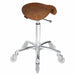 Joiken professional saddle stool in tan upholstery with polished chrome base