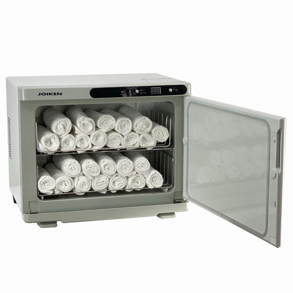 Joiken towel warmer filled with rolled white towels showing 20 to 30 towel capacity