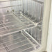 Detailed view of the hygienic stainless steel towel grills inside the Joiken warmer