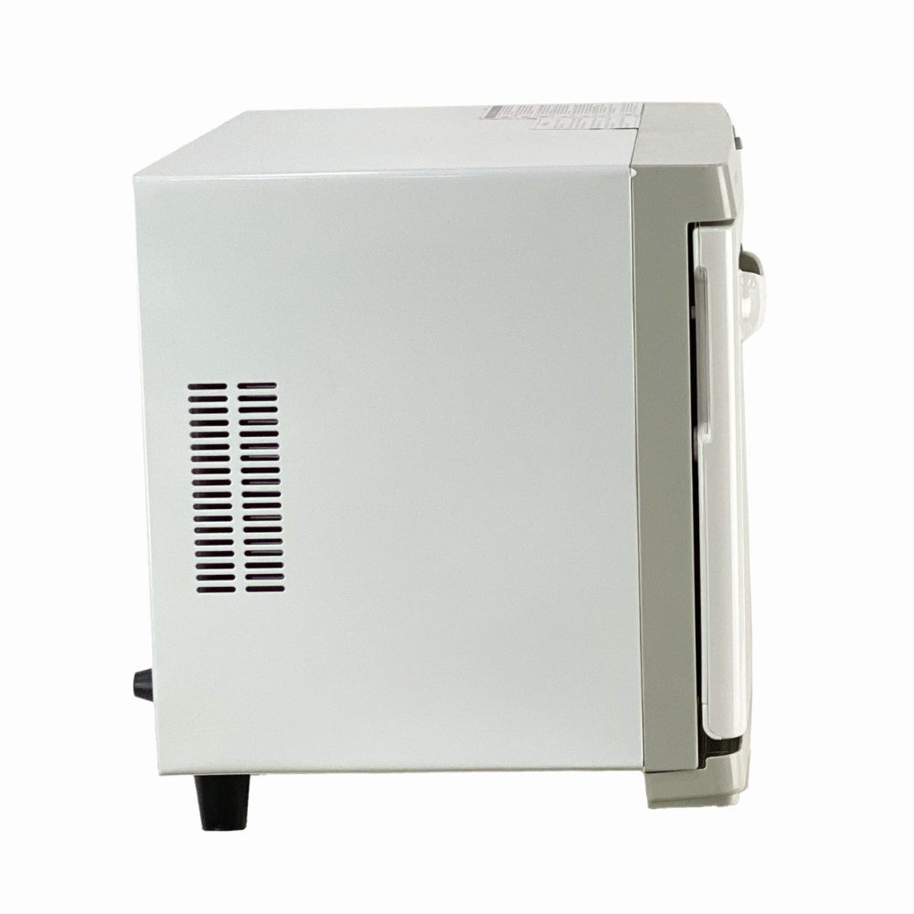 Side profile of Joiken towel warmer showing cooling vents and compact design