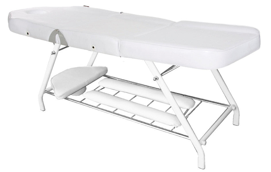 White Joiken Tulip beauty bed shown in flat position highlighting the under-bed rail storage shelf for towels