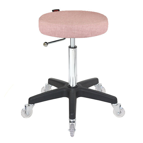 Joiken Turbo Stool featuring dusty pink upholstery and a durable black base for beauty salons
