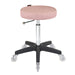Joiken Turbo Stool featuring dusty pink upholstery and a durable black base for beauty salons