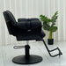 Side profile of the Karma Batemans Bay salon chair highlighting the cushioned armrests and hydraulic lever