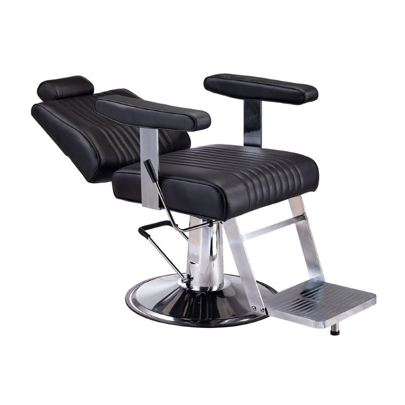 Karma Belmore barber chair in a fully reclined position with headrest extended for shaves