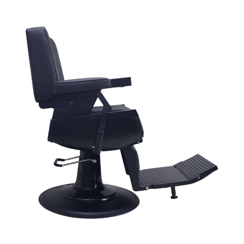 Profile view of the Karma Brisbane barber chair in a matte black finish with footrest