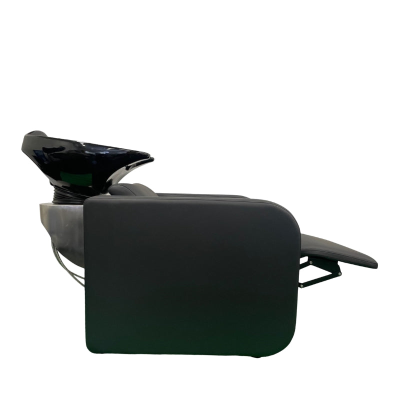 Side view of the Karma Clunes electric basin unit showing the reclined position and black ceramic wash bowl