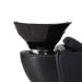 Close up of the adjustable black tilting ceramic basin and neck rest on the Karma Daylesford shampoo unit